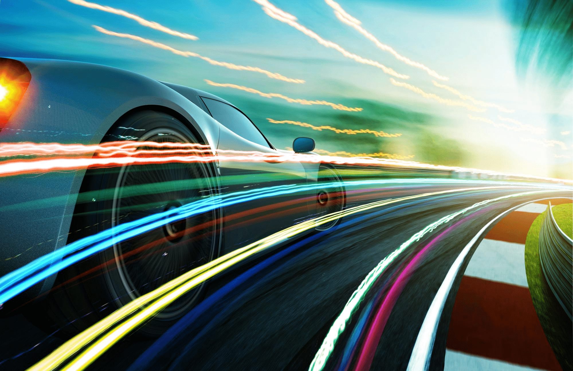 getting-ahead-of-the-curve blurred-motion-of-gray-car-rounding-a-curve-with-light-streaks